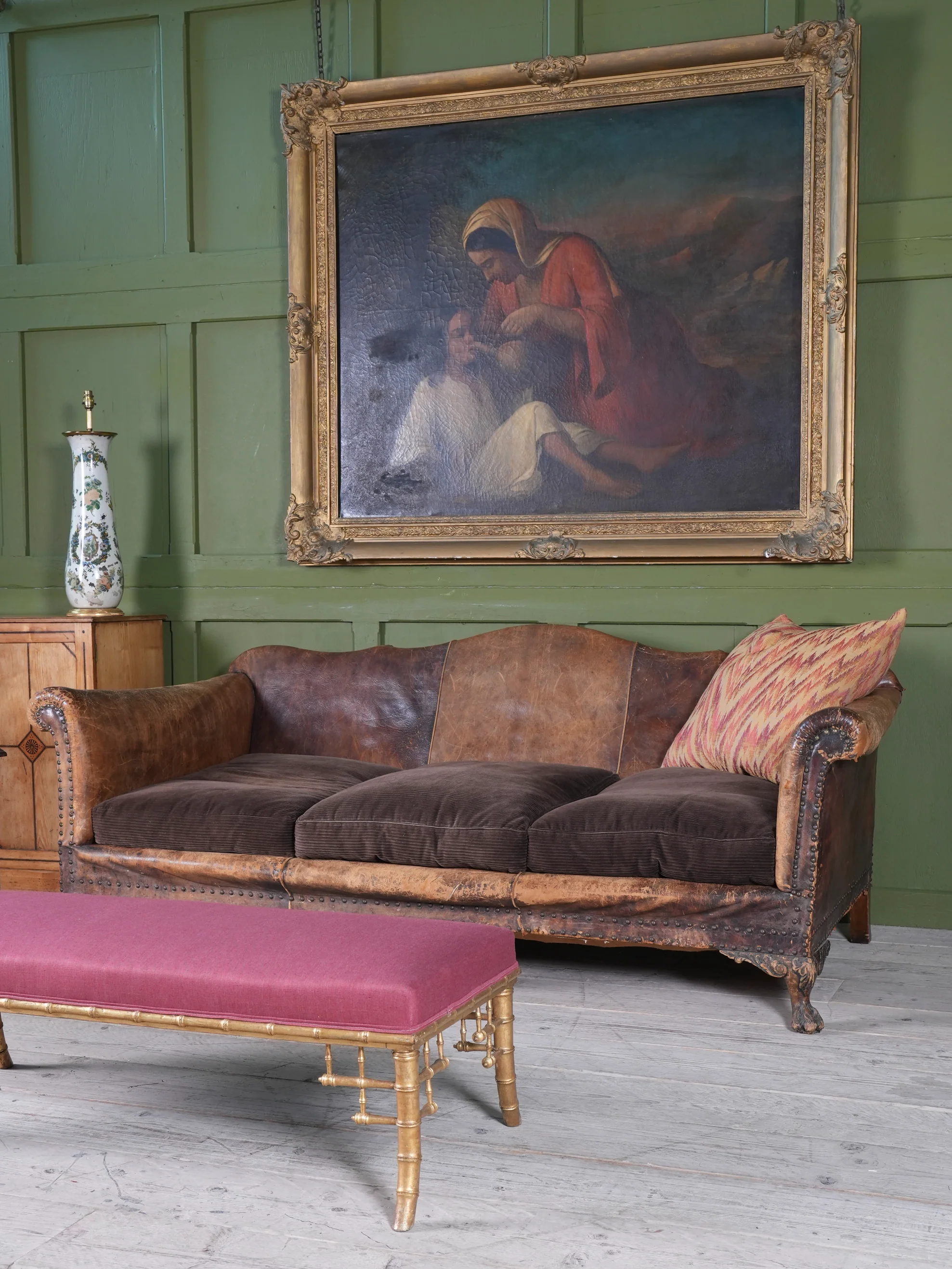 A Large Leather Camelback Sofa - Image 12