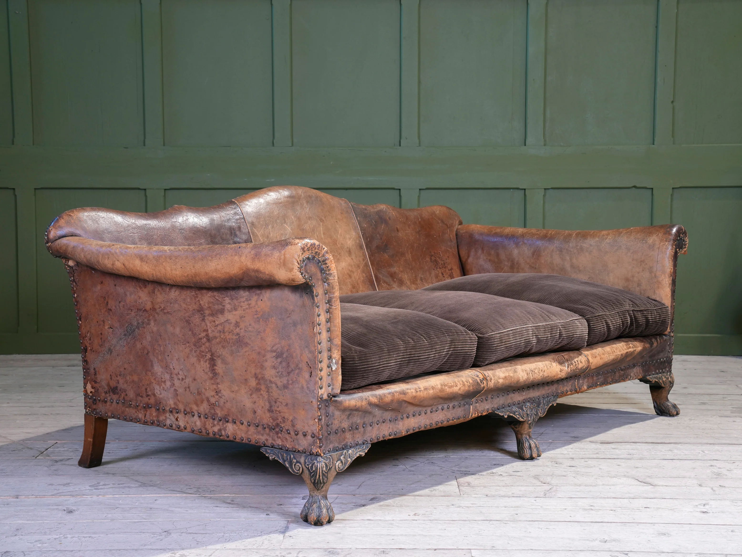 A Large Leather Camelback Sofa - Image 13