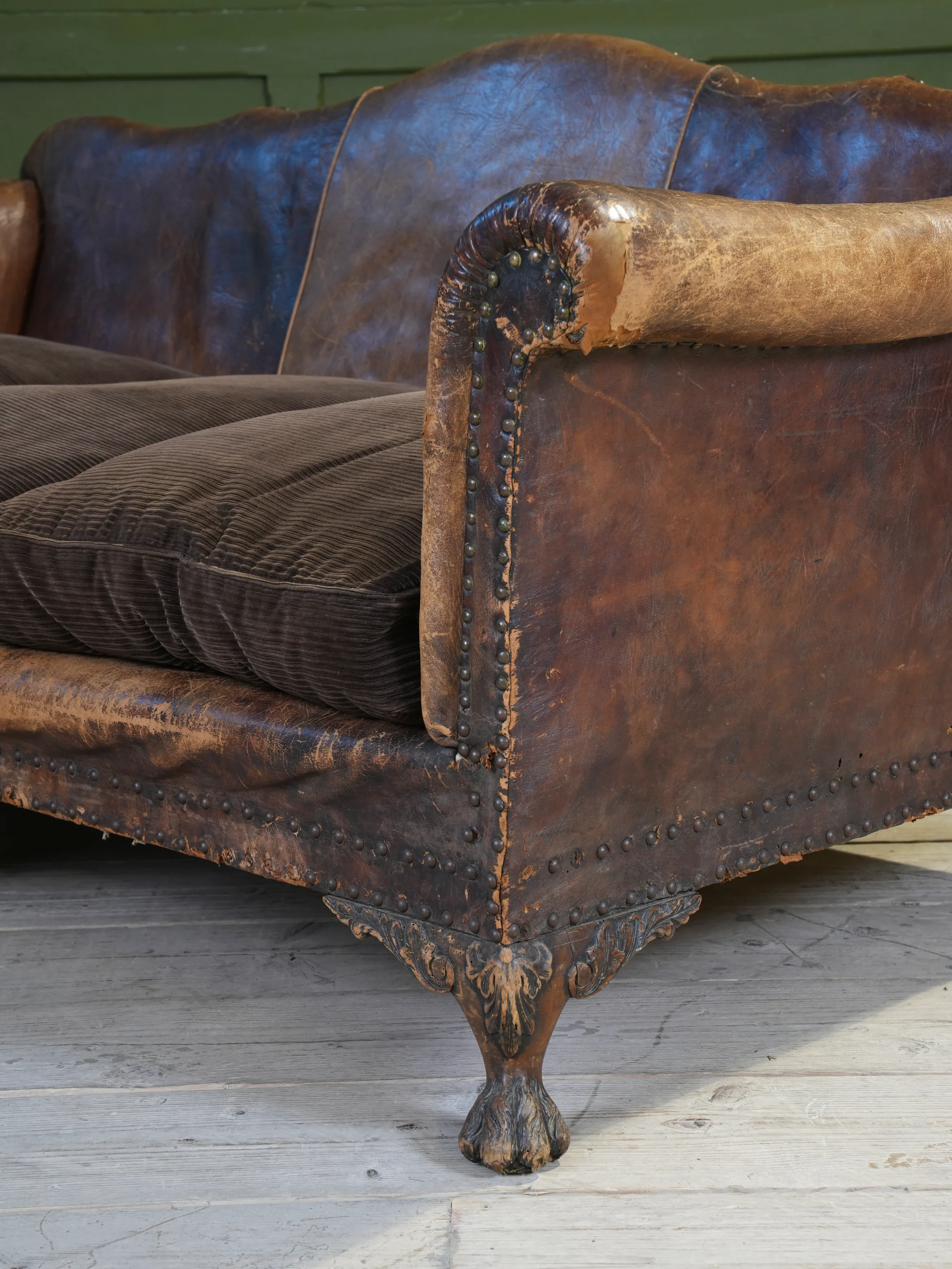 A Large Leather Camelback Sofa - Image 5