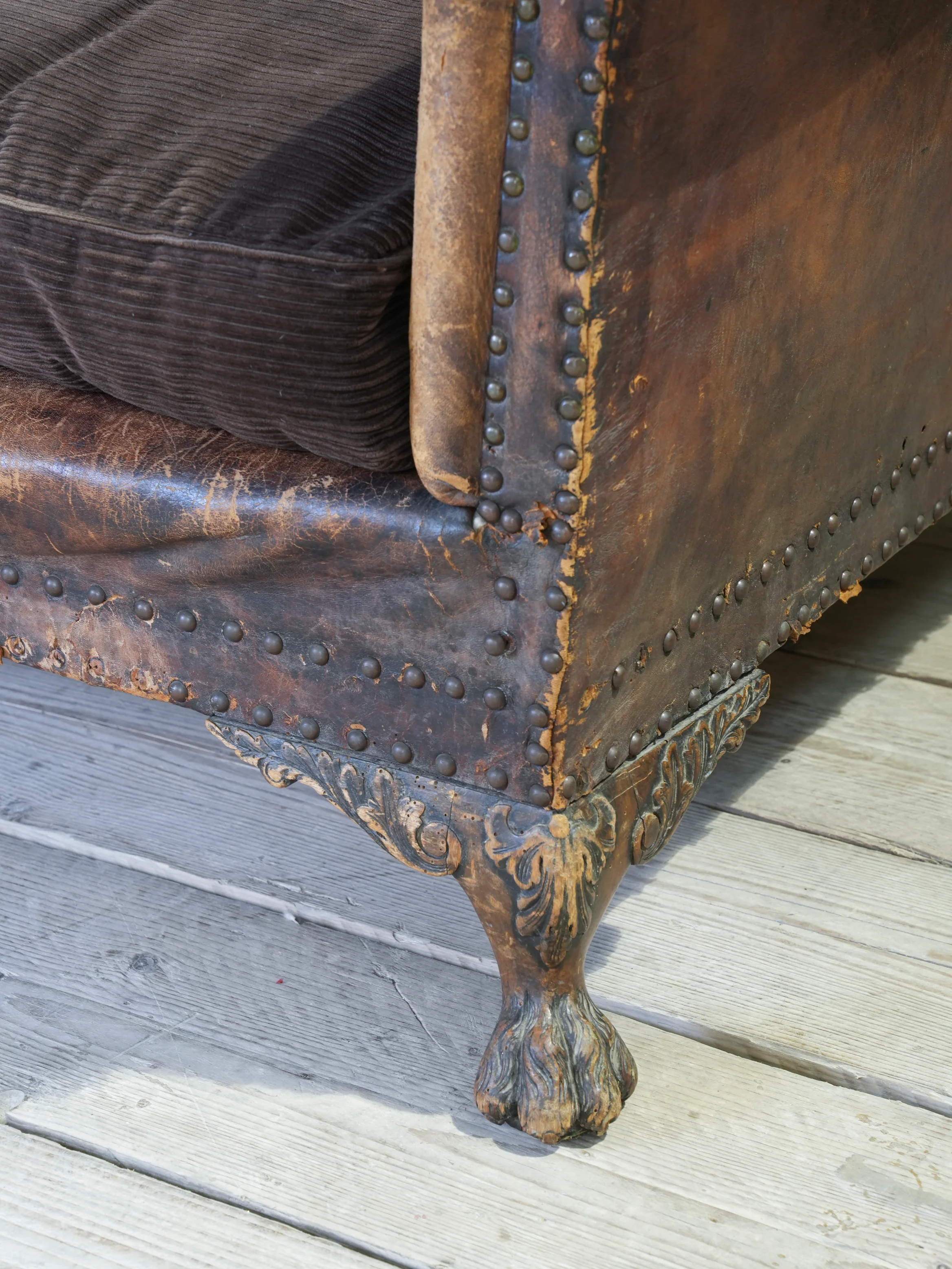 A Large Leather Camelback Sofa - Image 8